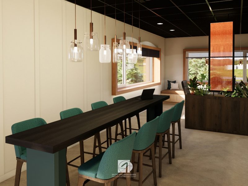 “Interieur van kantoorruimte in bouwunit met meerdere werkplekken, ingetogen kleuren en veel daglicht.