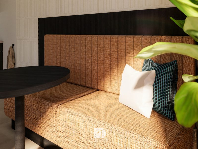 “Interieur van kantoorruimte in bouwunit met meerdere werkplekken, ingetogen kleuren en veel daglicht.